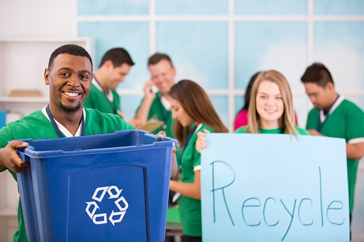 People in Green Shirts Recycling