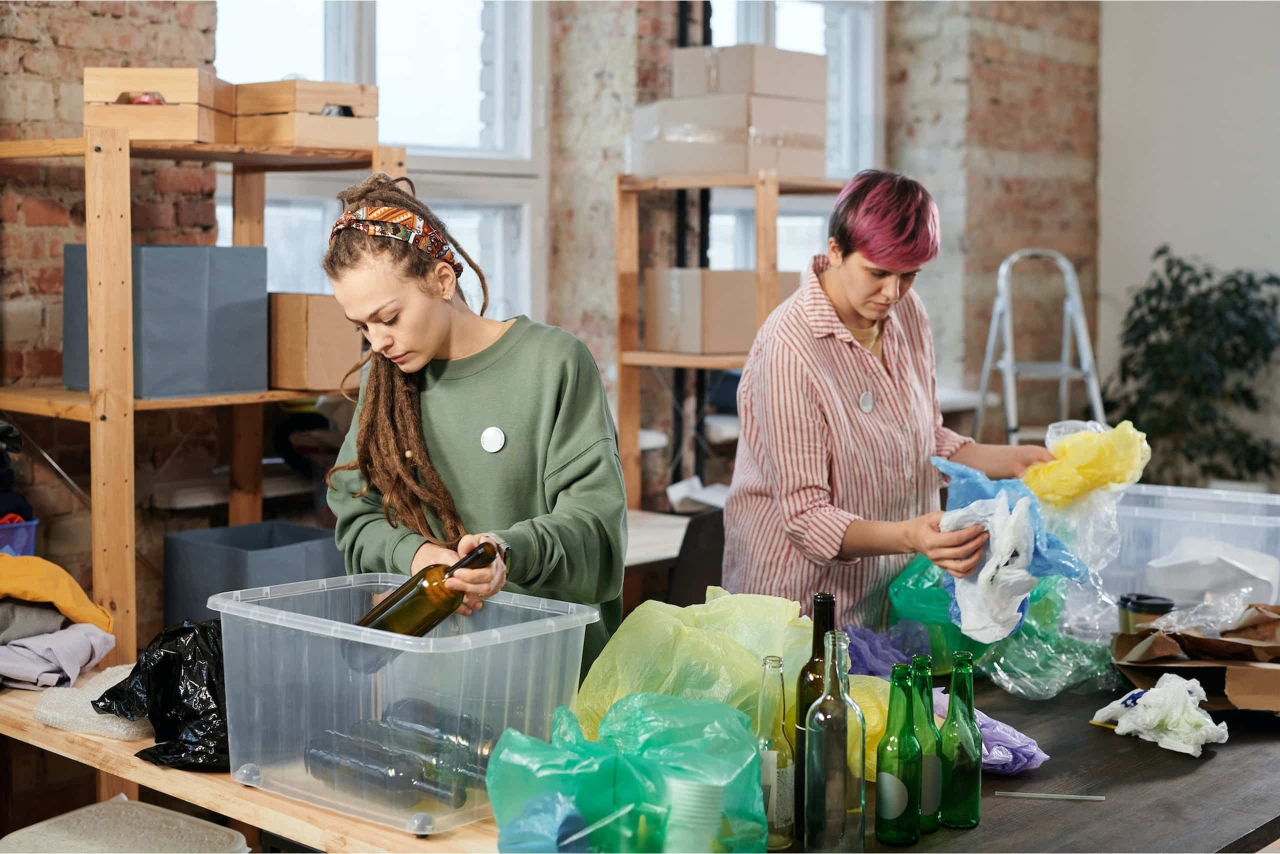 women sorting recyclables